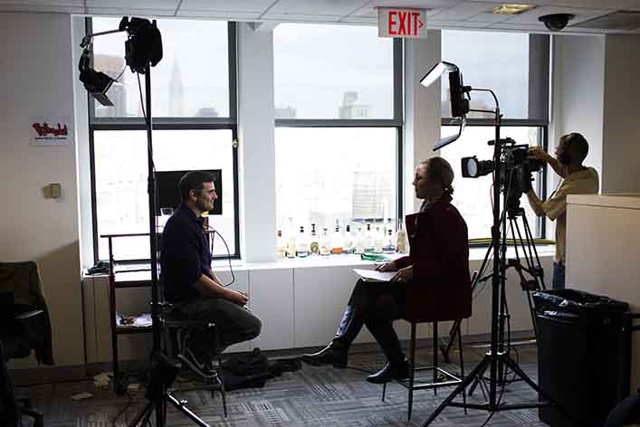 A marketing influencer tells his brand story on camera. Brand storytelling is essential to authentic content marketing.